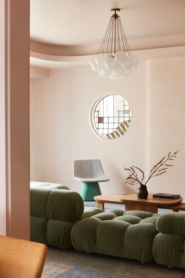 One of the home's original round stained glass windows in the lounge.