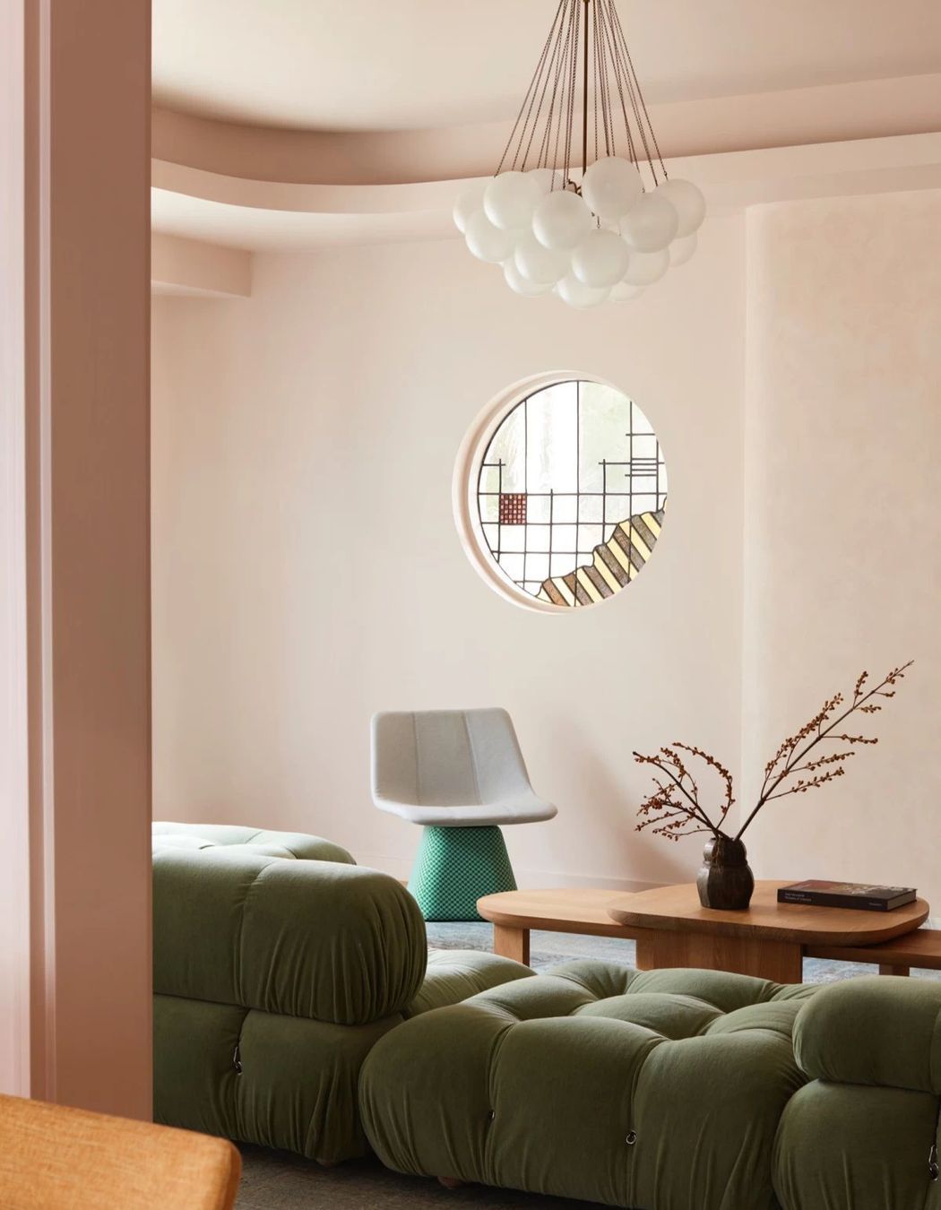  One of the home's original round stained glass windows in the lounge.