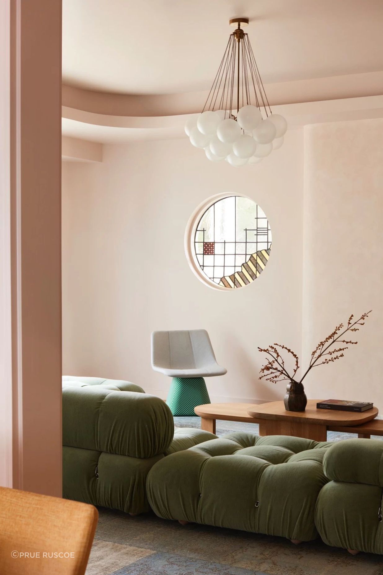 One of the home's original round stained glass windows in the lounge.