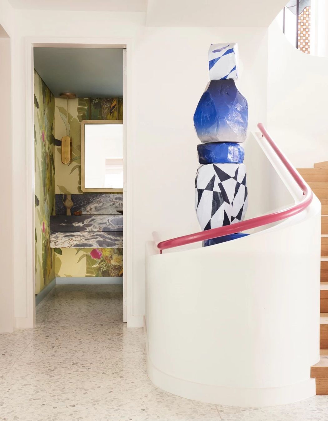 The  bold sculpture by artist Elliott Routledge makes a statement in the foyer.