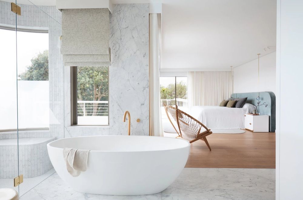 Open and airy, the main bedroom suite is a parents-only haven.