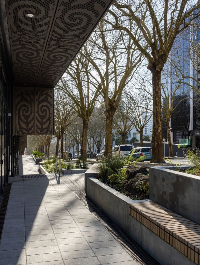 The beautiful koru patterns designed by Katz can be experienced up close along the street frontage of Te Mātāwai.