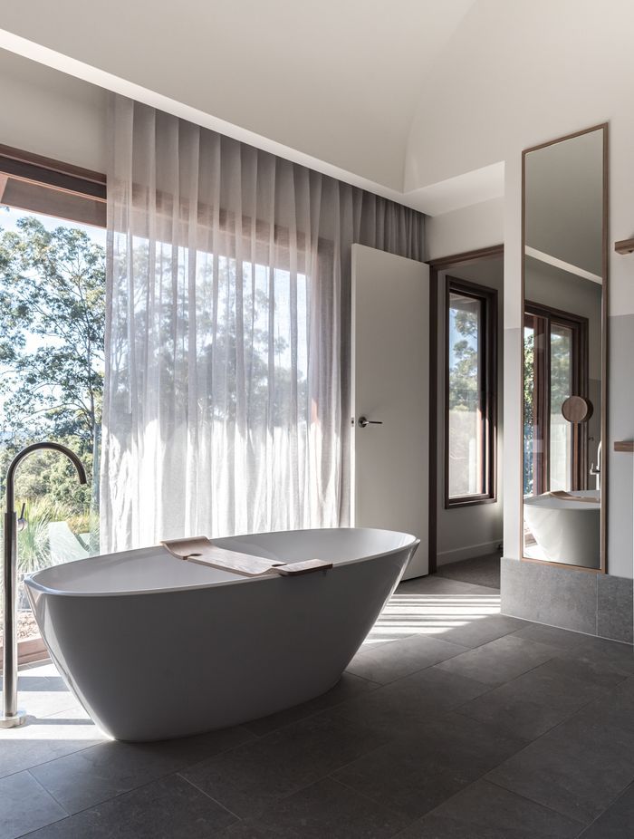 Natural lighting falls onto the bath tub | Photography: Emma Bourne &amp; David Chatfield