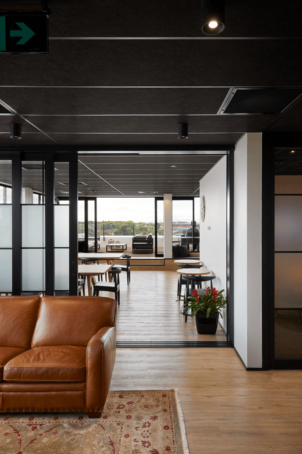 The top floor can be opened right up from one side to the other for company events and large gatherings.