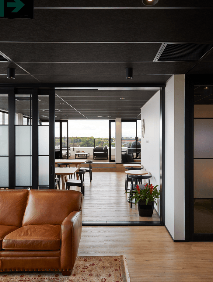 The top floor can be opened right up from one side to the other for company events and large gatherings.