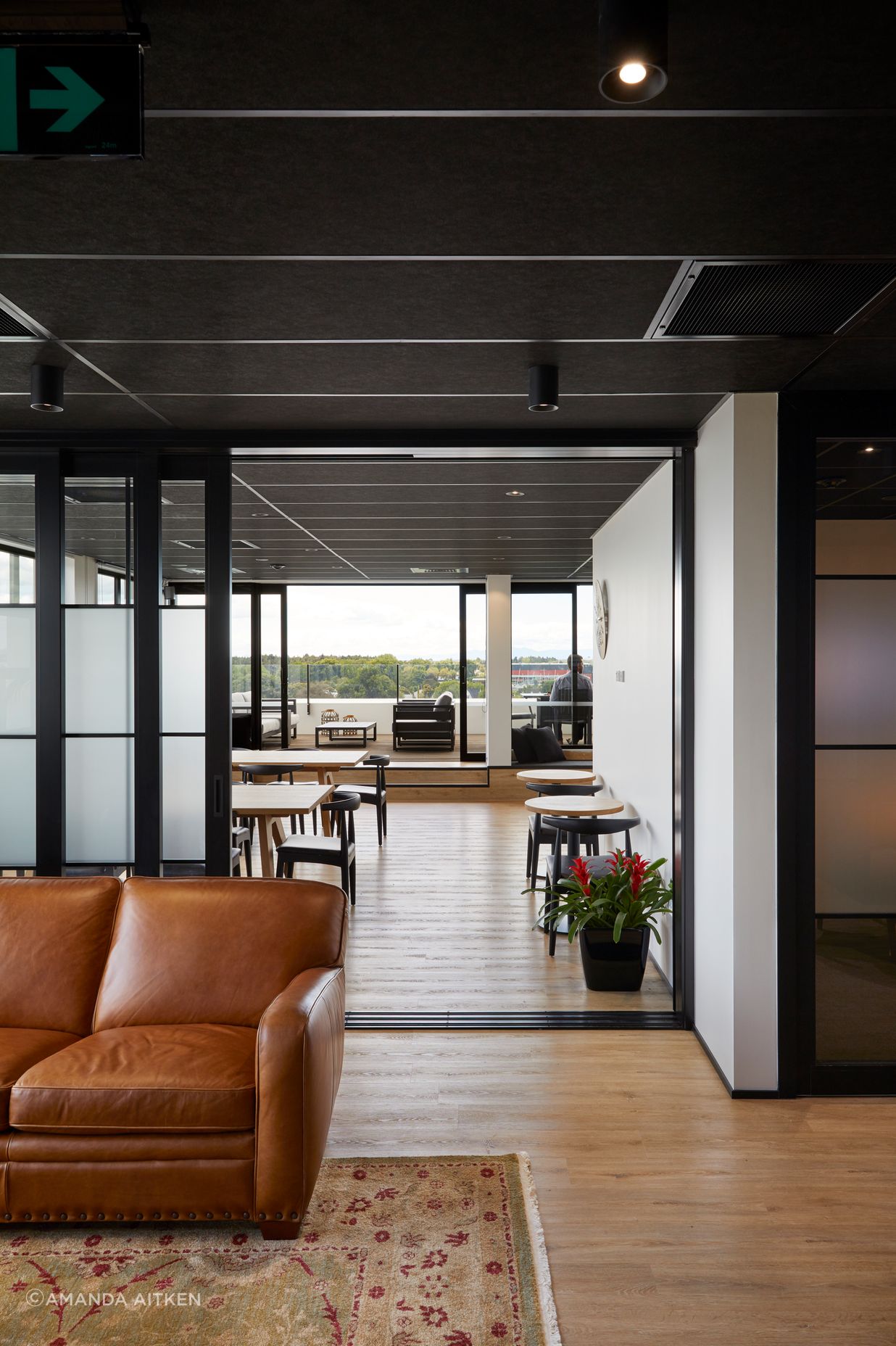 The top floor can be opened right up from one side to the other for company events and large gatherings.