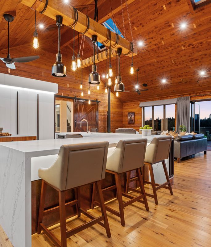 Macrocarpa timber stars in this award-winning 1184sqm lodge