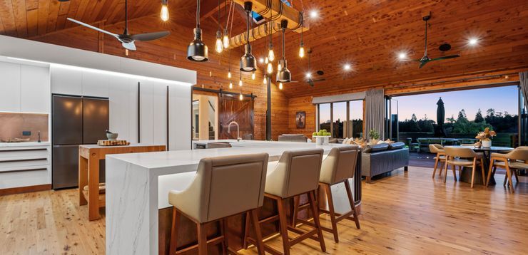 Macrocarpa timber stars in this award-winning 1184sqm lodge