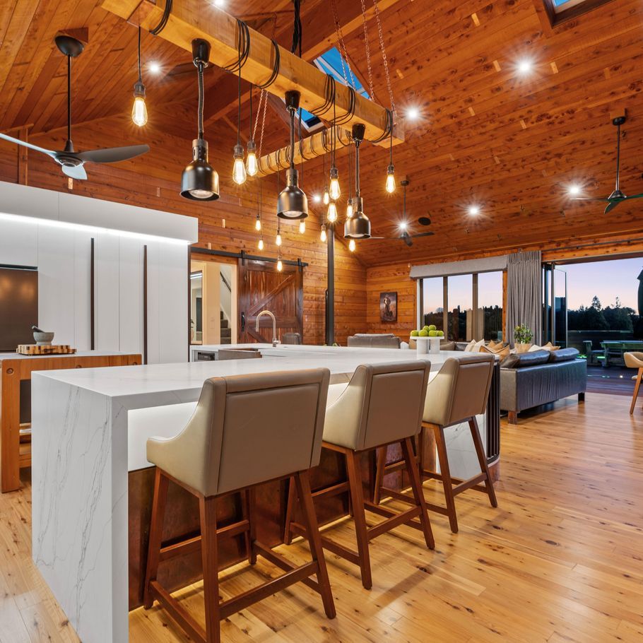 Macrocarpa timber stars in this award-winning 1184sqm lodge