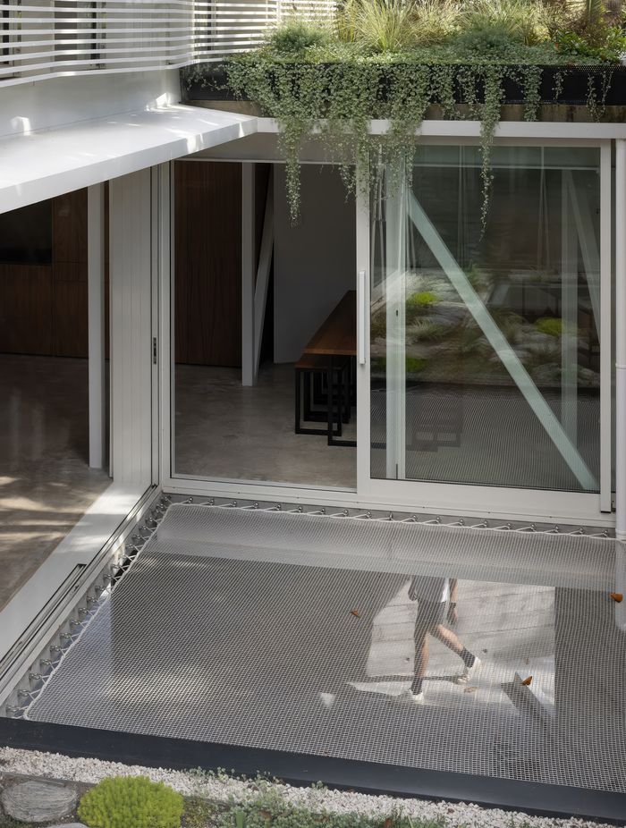 Playful interior elements include stretches of hammocks.