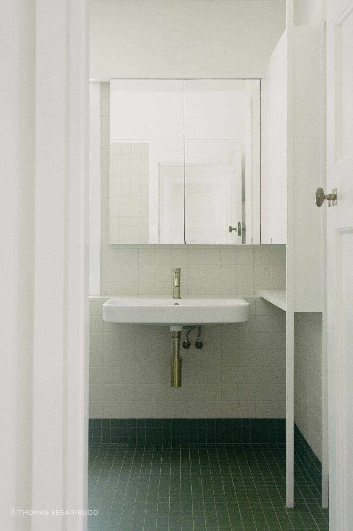 The family bathroom received a muted, classic upgrade.