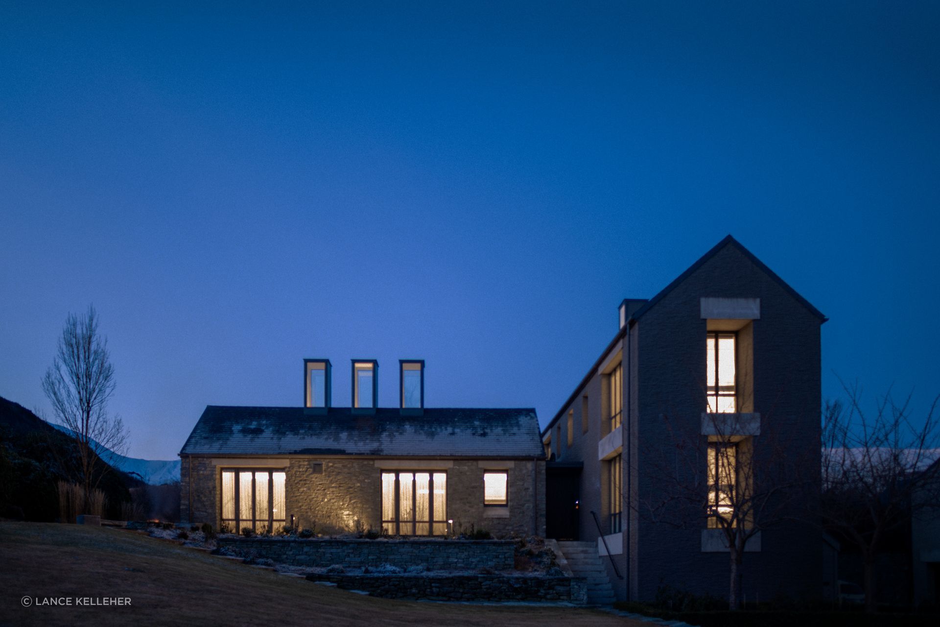The original building, built in the early-2000s references the early stone buildings found in the area, and was unchanged in the refurbishment, apart from the front door, which was replaced with a more substantial door, befitting the architecture.