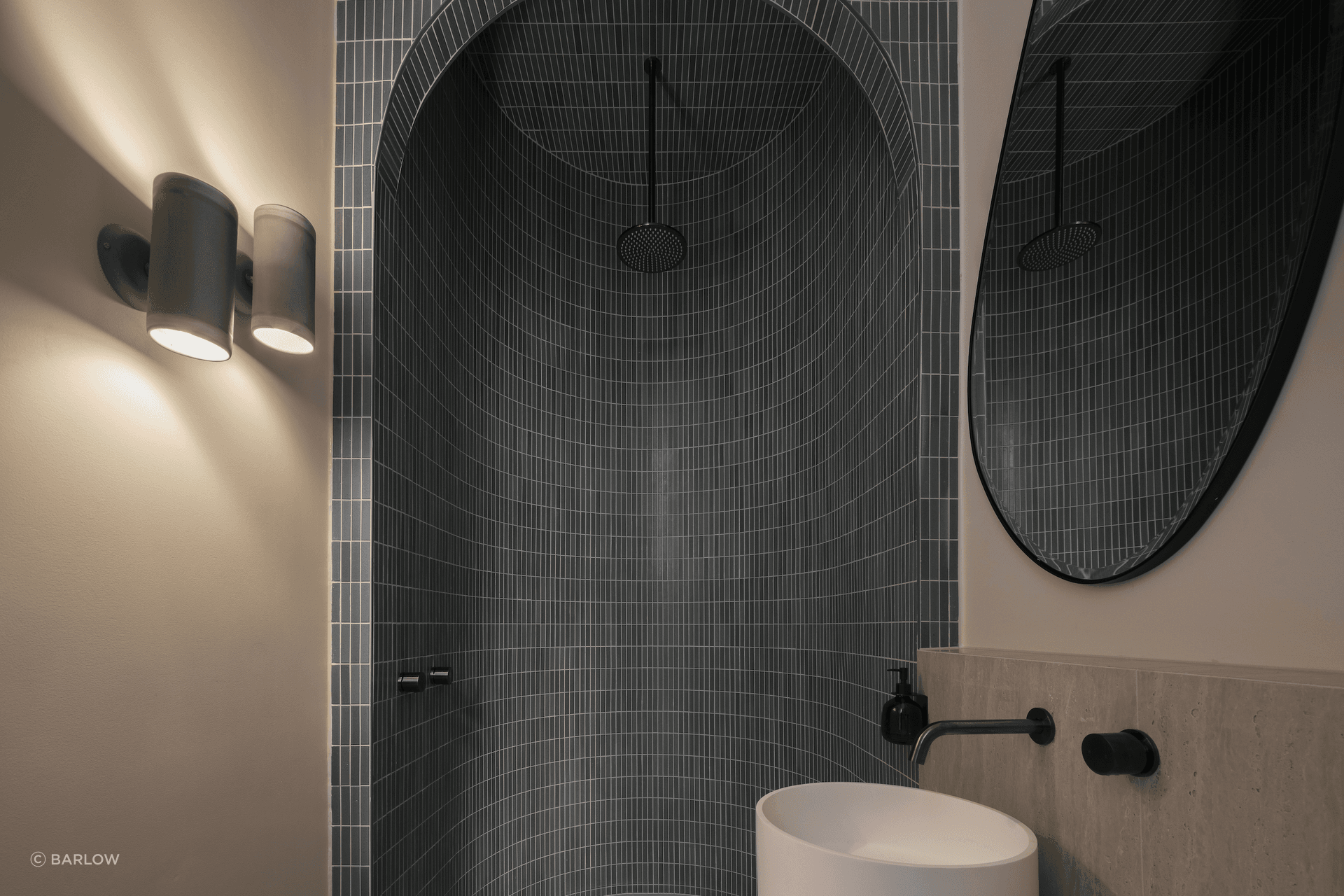 Handmade tiles add colour and texture to the downstairs bathroom.