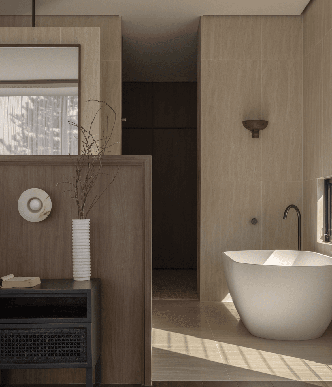 Taking cues from the ground floor, the master suite is open-plan.