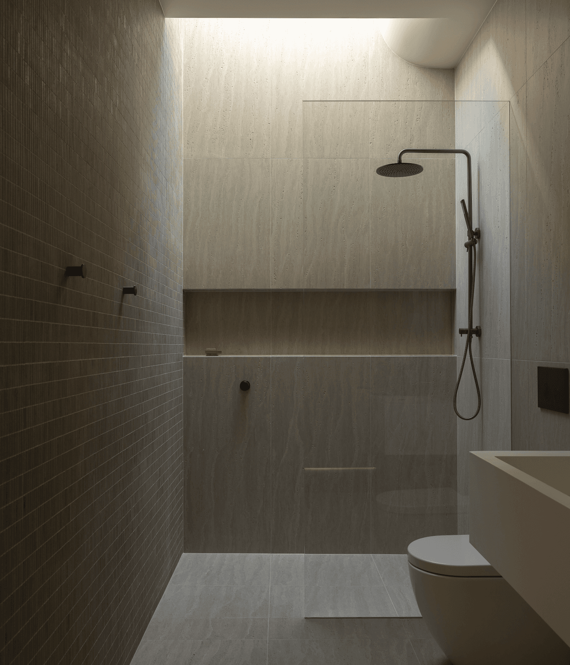 Light is welcomed in from above with the curved ceiling a reference to other parts of the home.