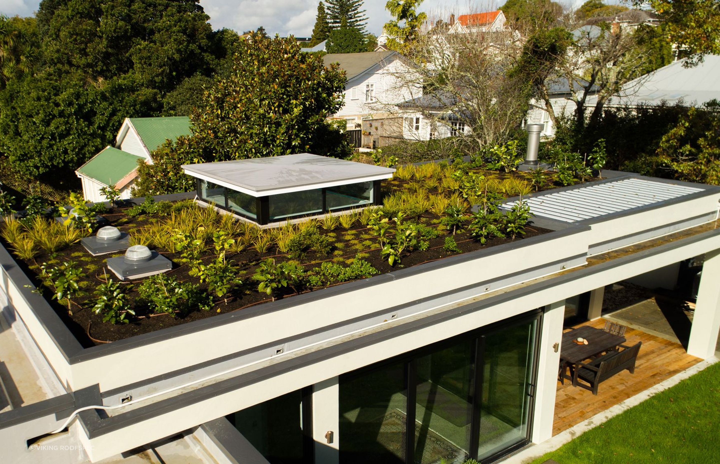 A green roof, like this one from Viking Roofspec, can add colour and life to an otherwise plain part of the home.