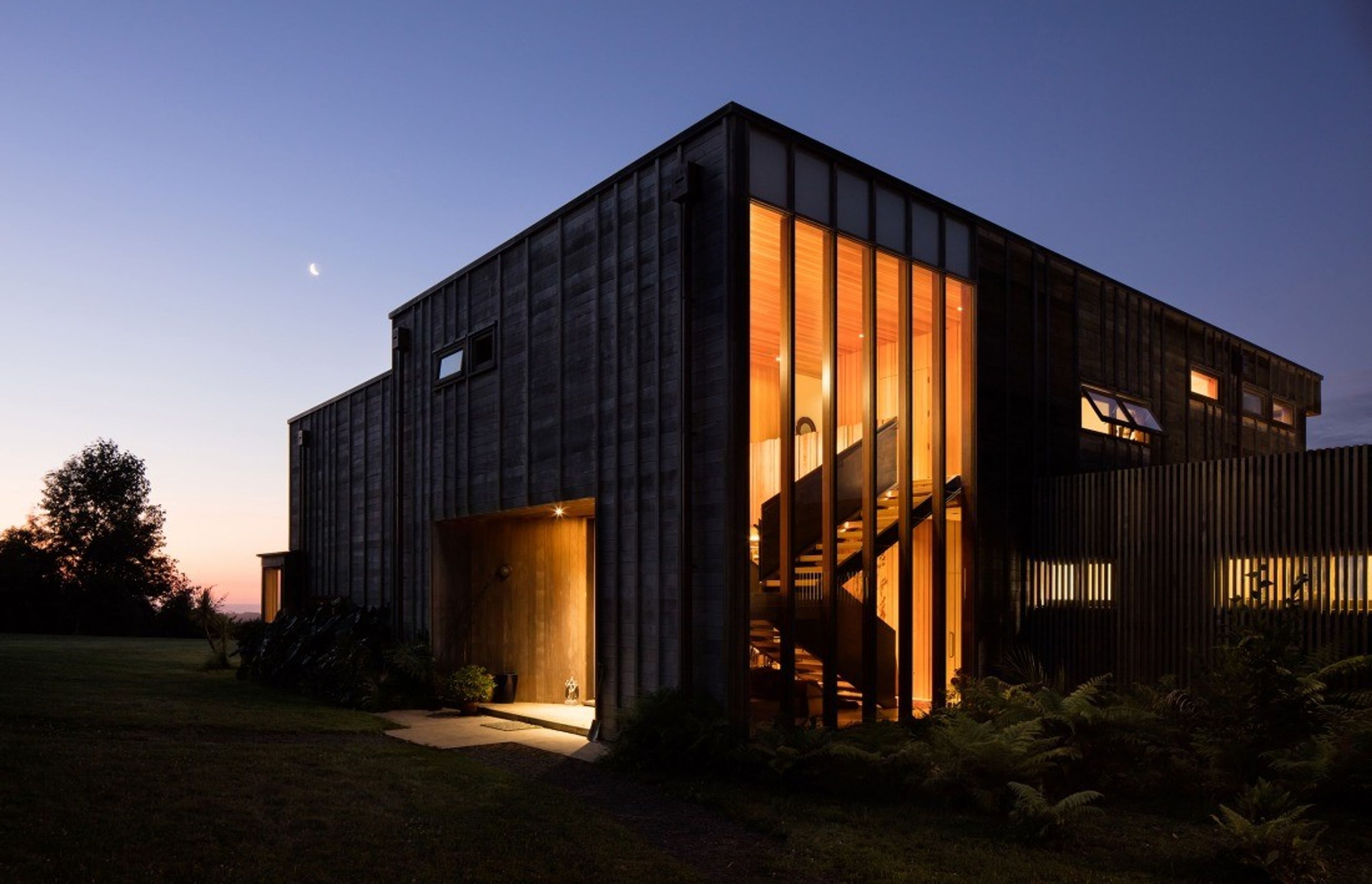 The highly detailed Bach Bach by night. By Crosson Architects, photo by Jason Mann Photography.