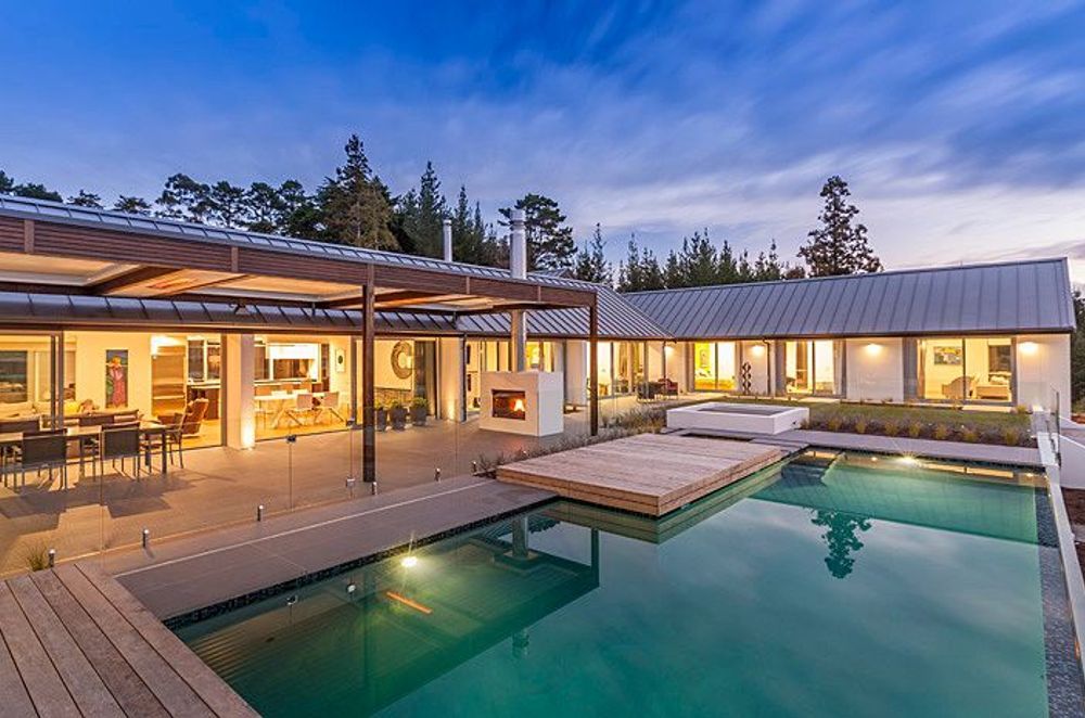 Scale and proportion are important for pool design. This pool easily sits into the house enclosure, with almost seamless connection.