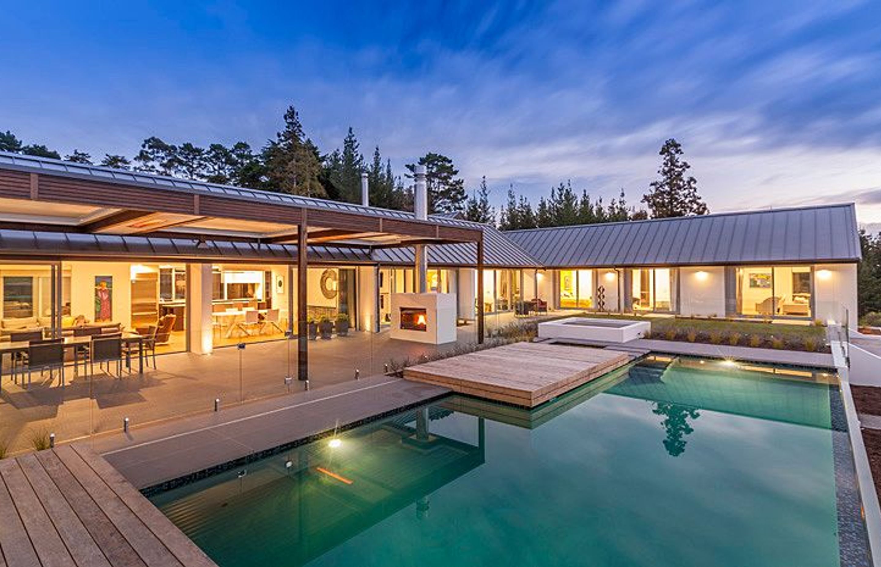 Scale and proportion are important for pool design. This pool easily sits into the house enclosure, with almost seamless connection.