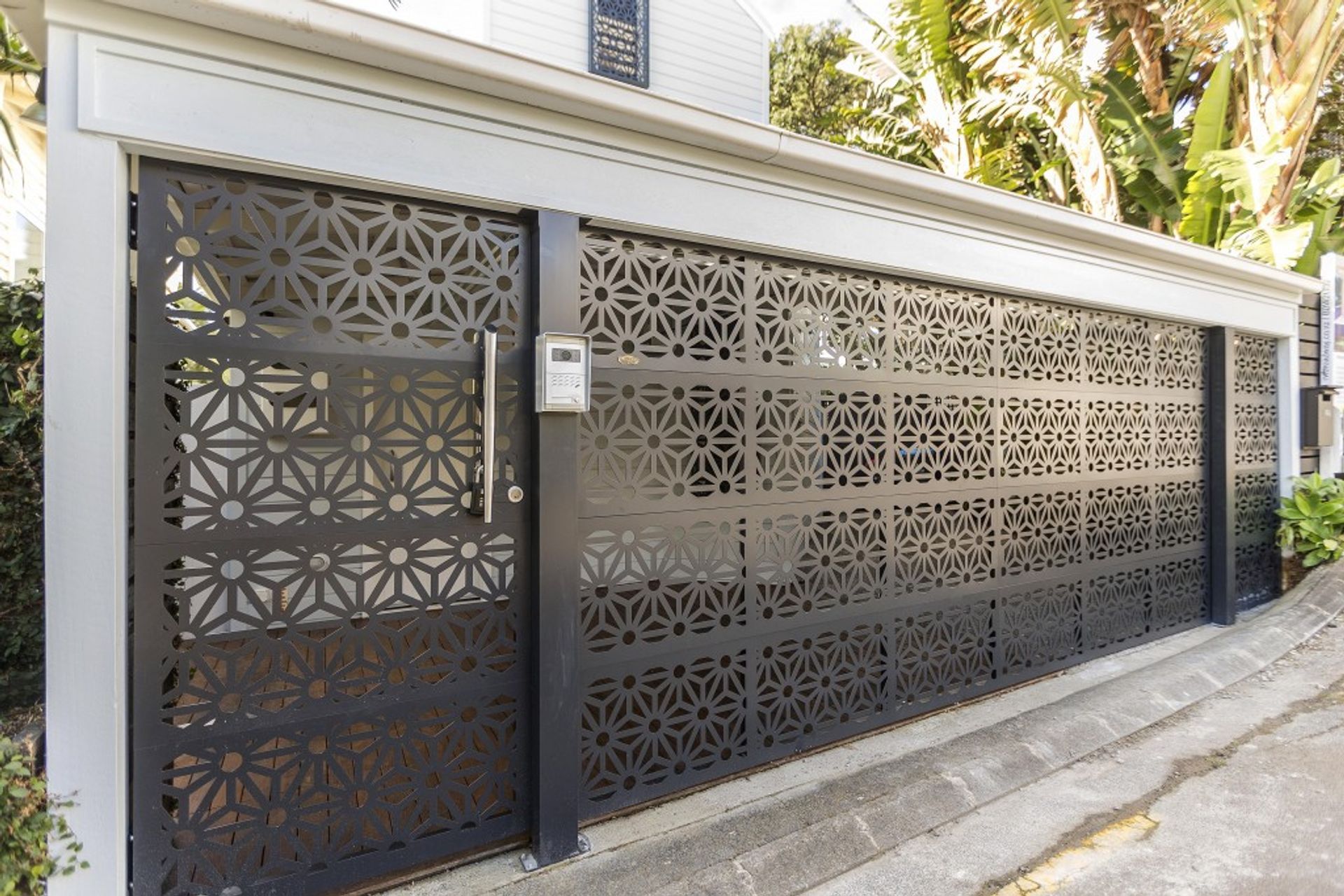 Designs for custom perforated garage doors, pedestrian gates and fences are only limited by your imagination