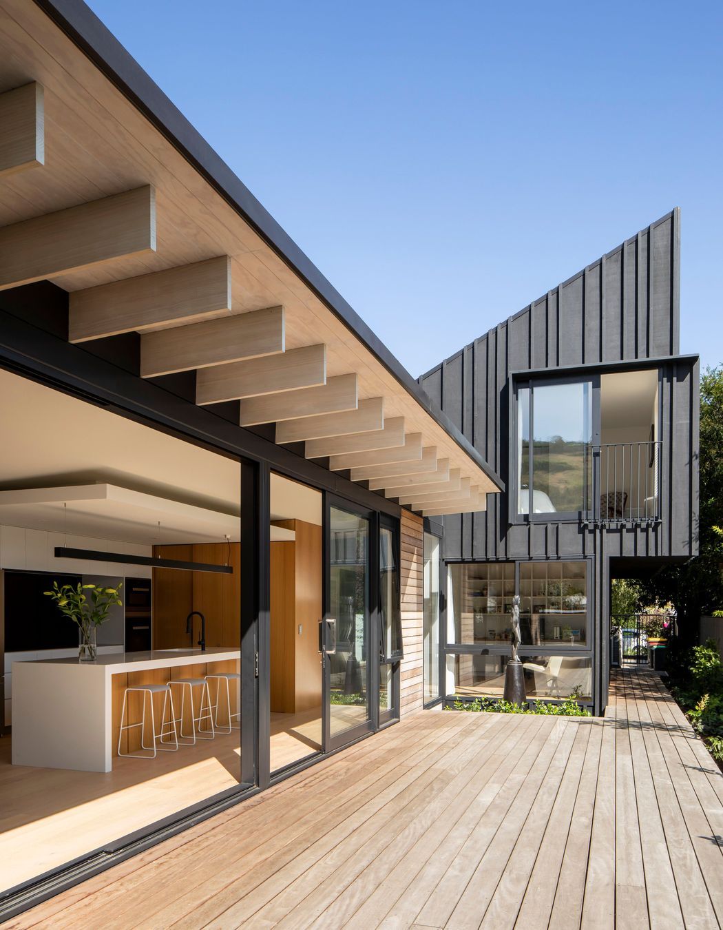 Thermally broken glazing and a generous eave overhang are two of the sustainble elements built into the house.