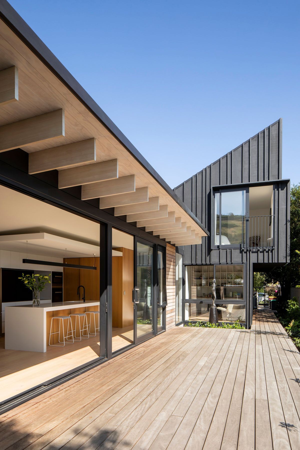 Thermally broken glazing and a generous eave overhang are two of the sustainble elements built into the house.
