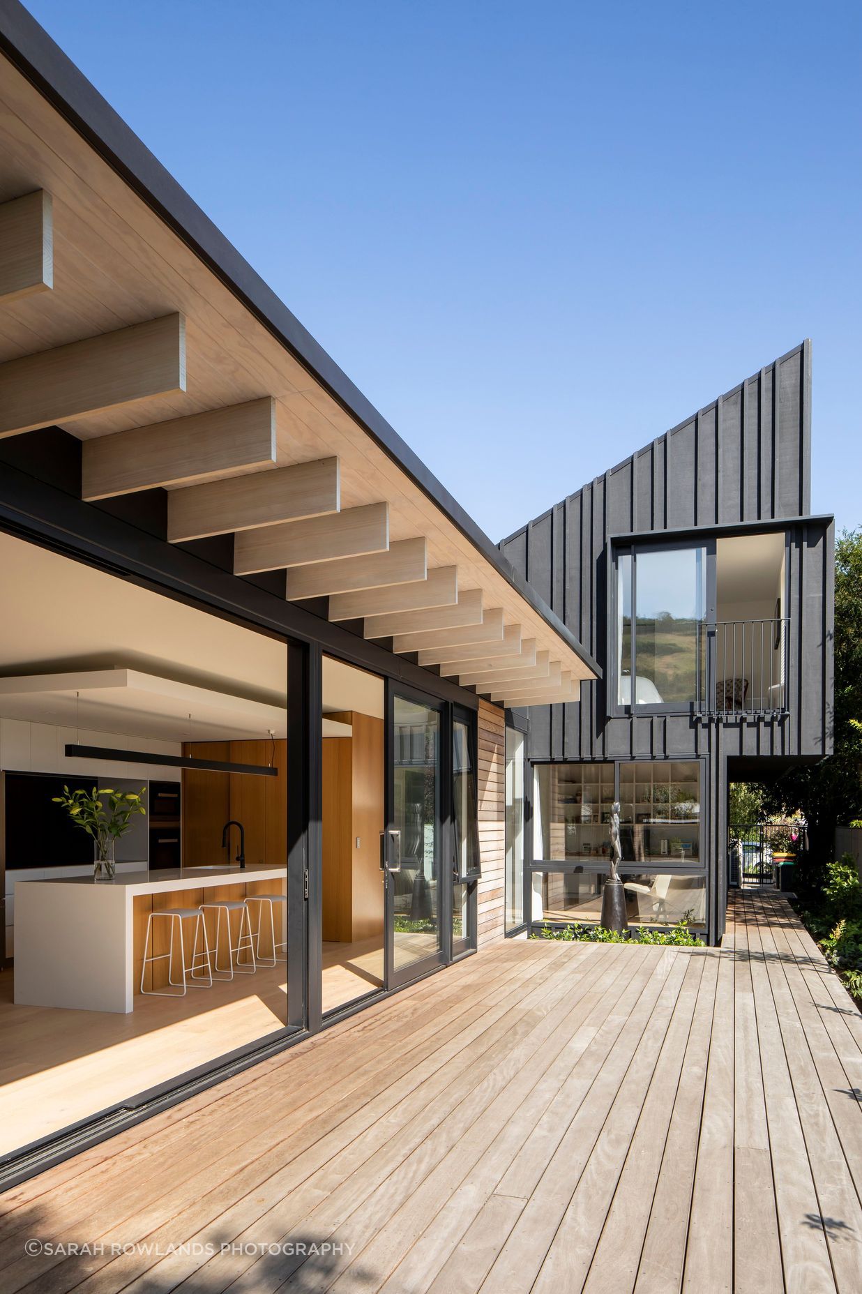 Thermally broken glazing and a generous eave overhang are two of the sustainble elements built into the house.