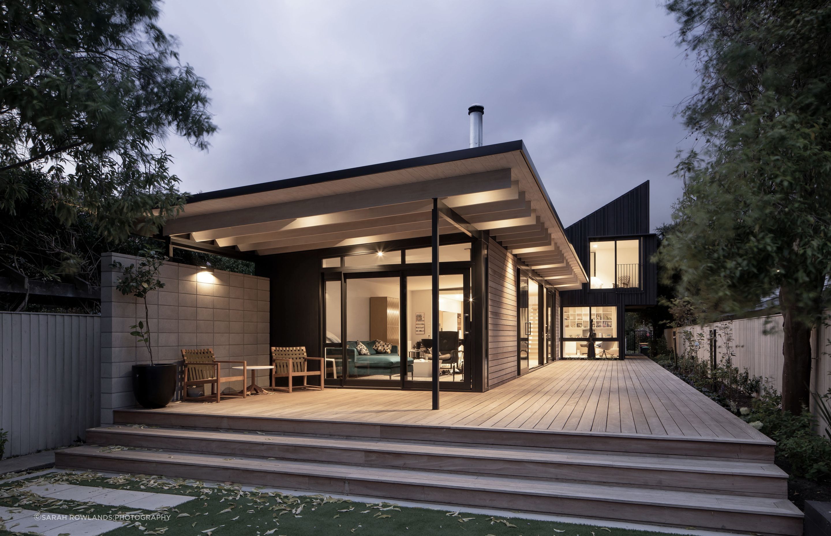 The homeowner wanted the house to feel connected to the outdoors so an ample deck and cantilevered roofline maximises outdoor living opportunities.