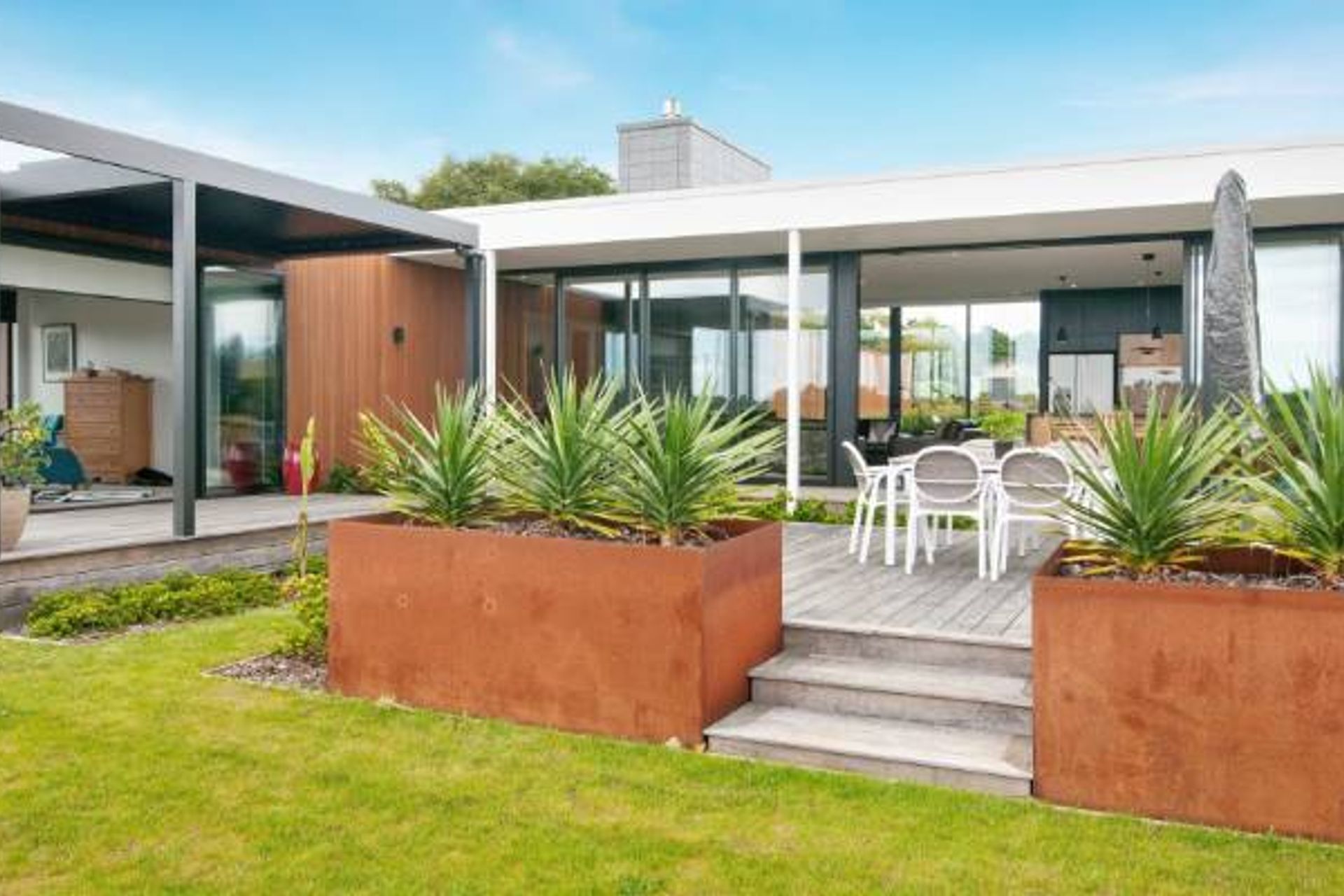 Large scale planters can have high impact in outdoor areas or courtyards.