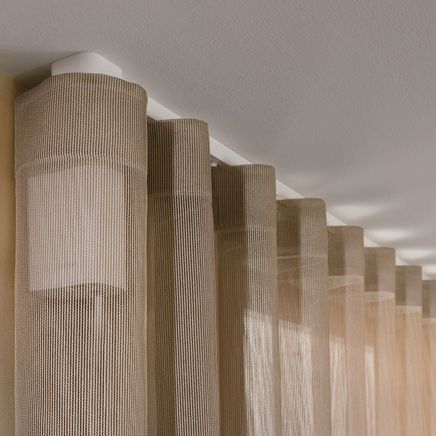 The architects of silence: floating, automated curtains