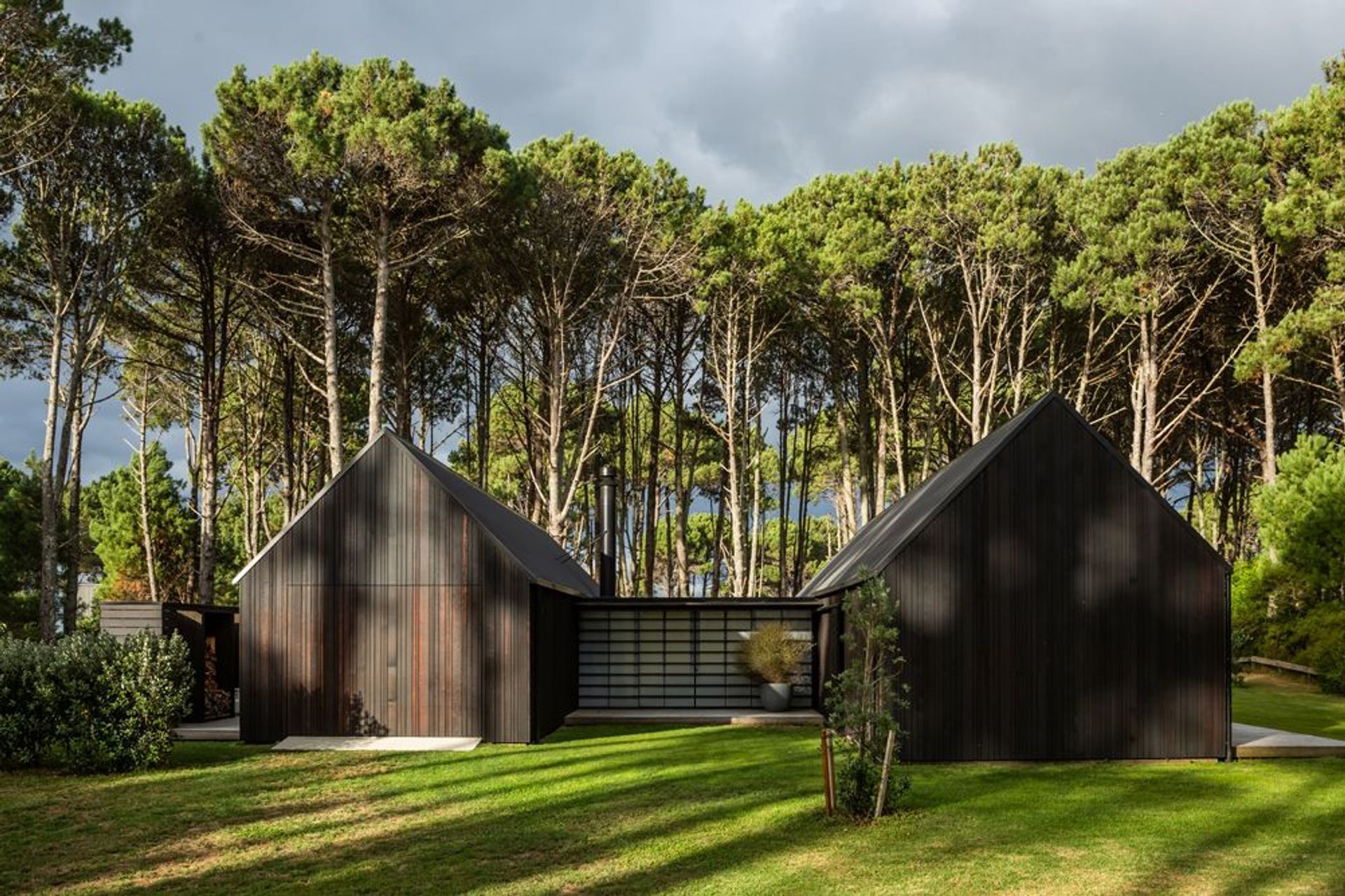 To the south, shoji screens provide shelter for this area and complete what appears to be a relatively blank facade when approached from the road.