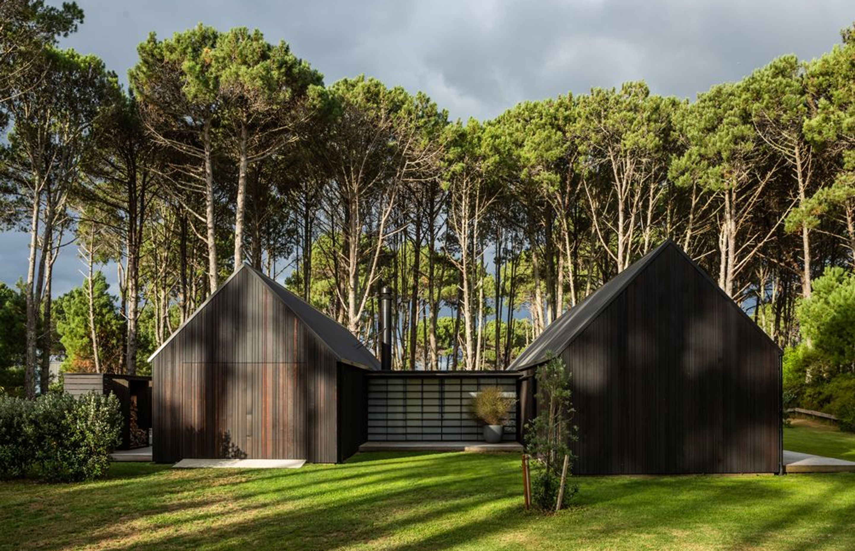 To the south, shoji screens provide shelter for this area and complete what appears to be a relatively blank facade when approached from the road.