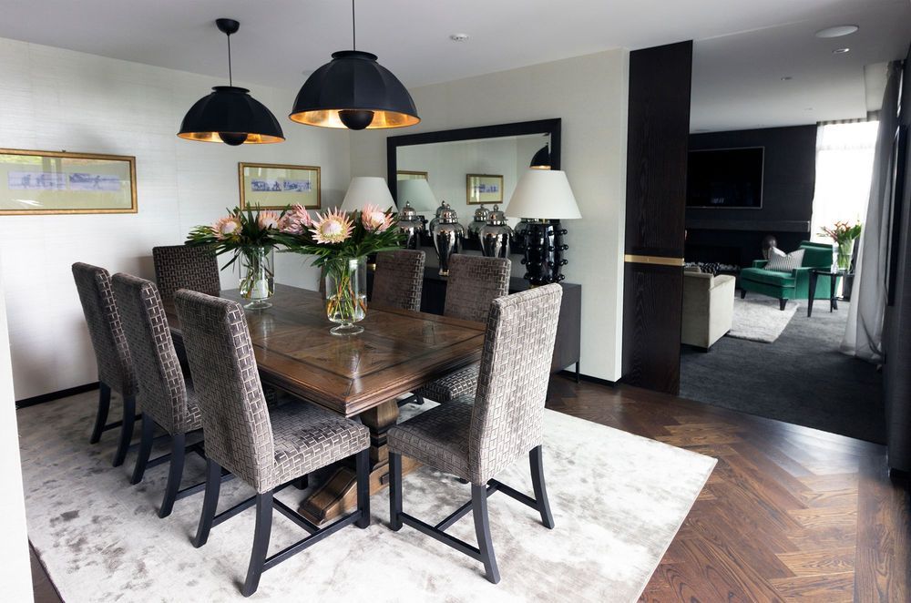 The Prosser project by TRENZSEATER features Cupola pendant lighting above the dining table.