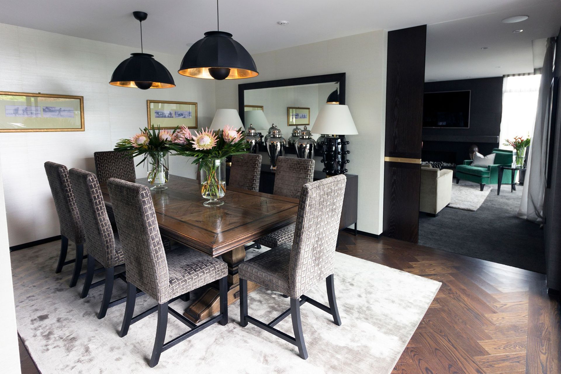 The Prosser project by TRENZSEATER features Cupola pendant lighting above the dining table.