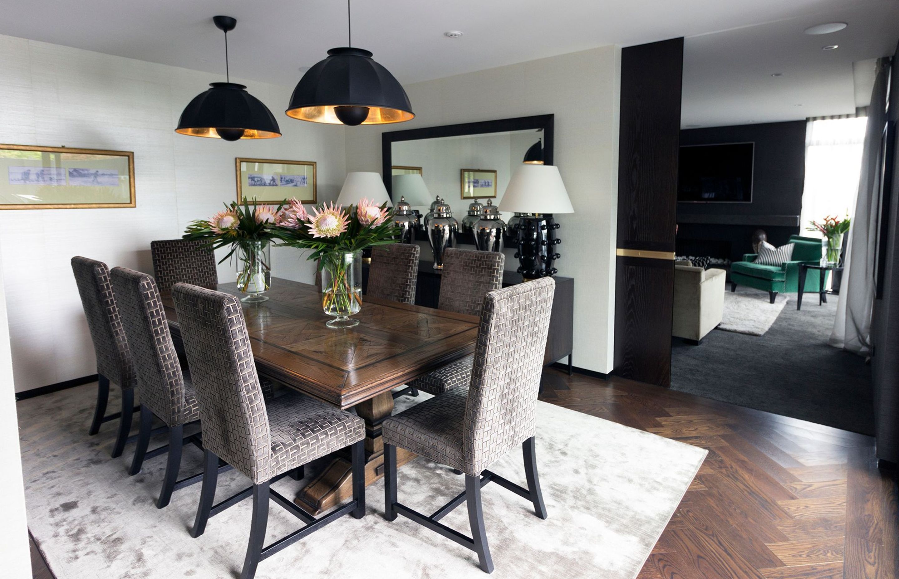 The Prosser project by TRENZSEATER features Cupola pendant lighting above the dining table.