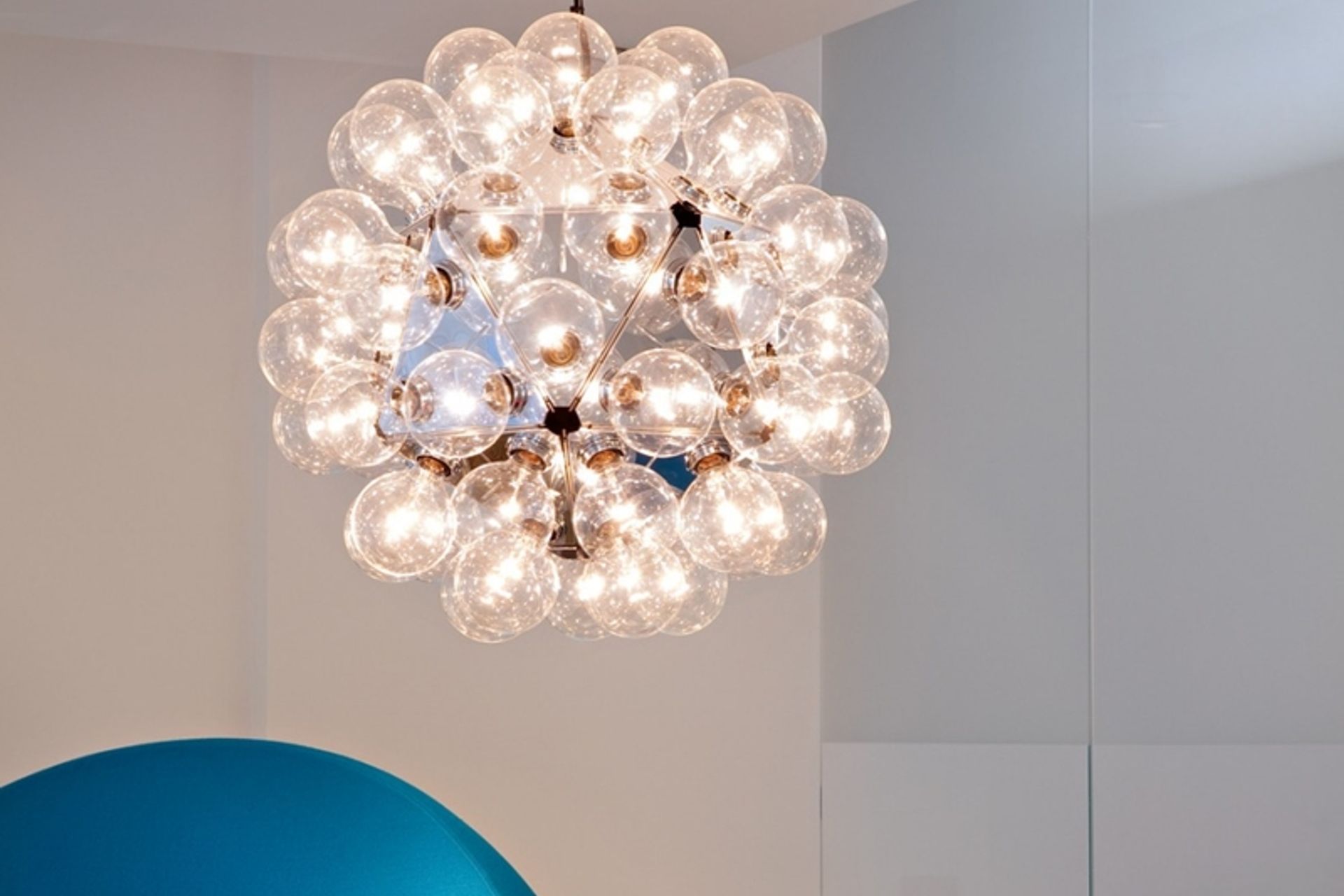 The Taraxacum suspension fixture resembles elegant Christmas baubles with metallic accents. 2. Nature's Noel