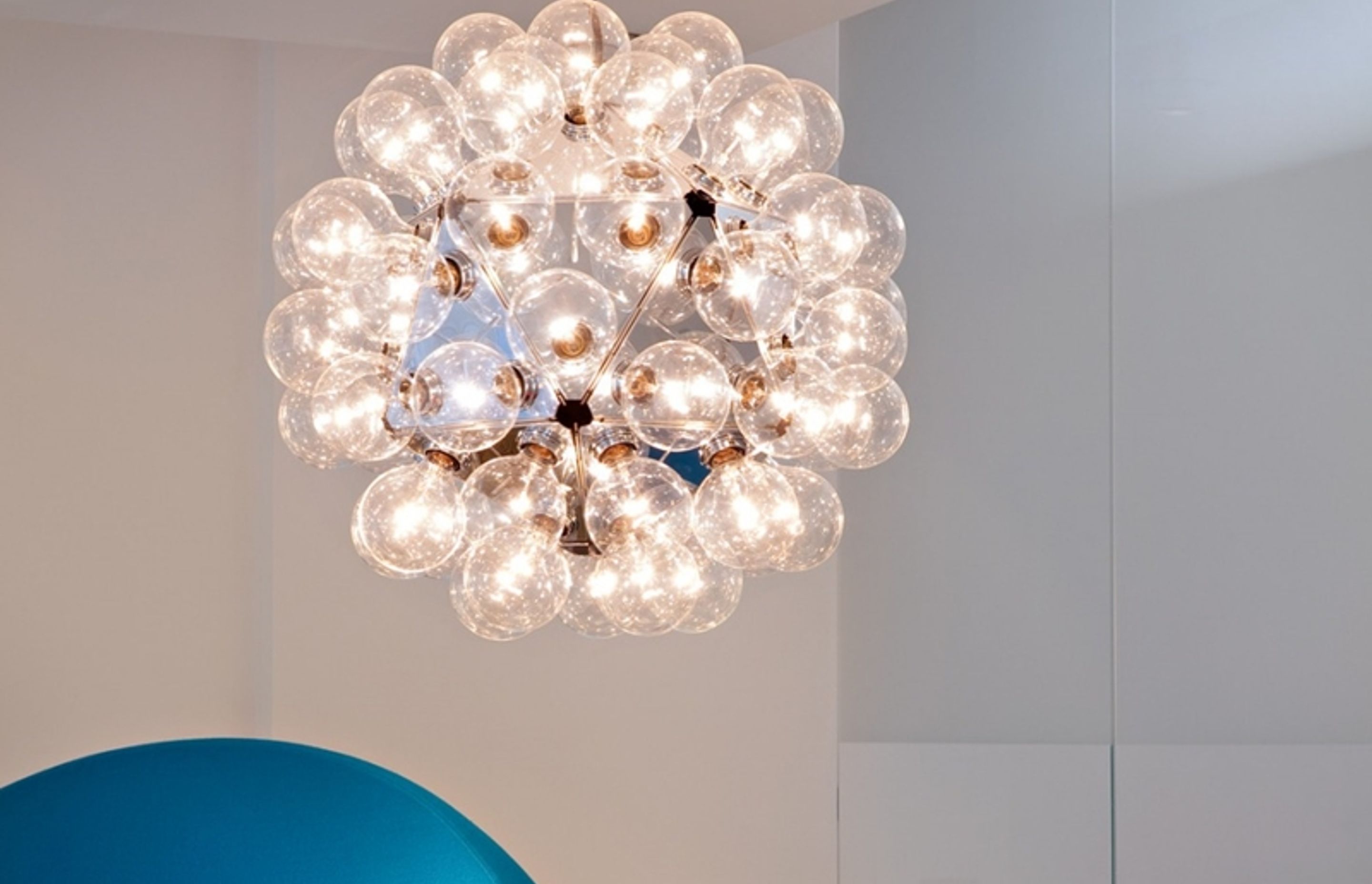 The Taraxacum suspension fixture resembles elegant Christmas baubles with metallic accents. 2. Nature's Noel 