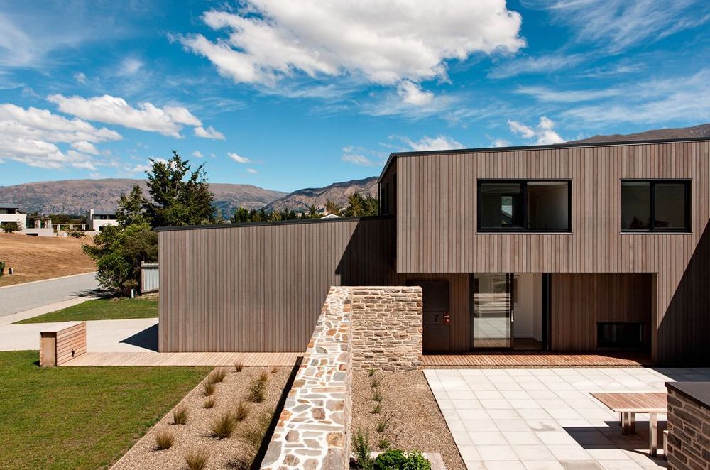 Briar Bank House project by Rafe Maclean Architects uses the INTERSET® Recessed Window Flashing System with vertical cedar cladding