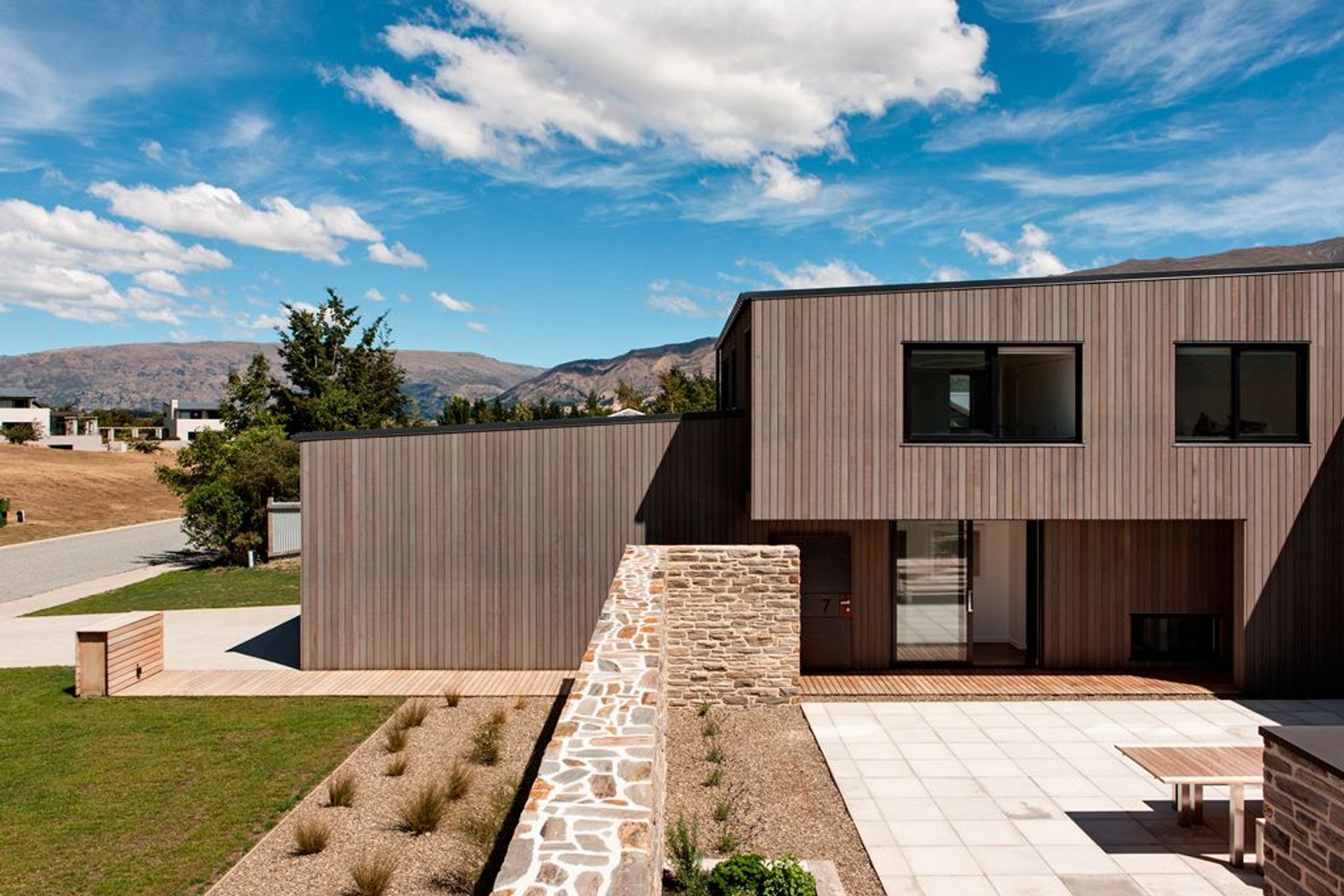 Briar Bank House project by Rafe Maclean Architects uses the INTERSET® Recessed Window Flashing System with vertical cedar cladding