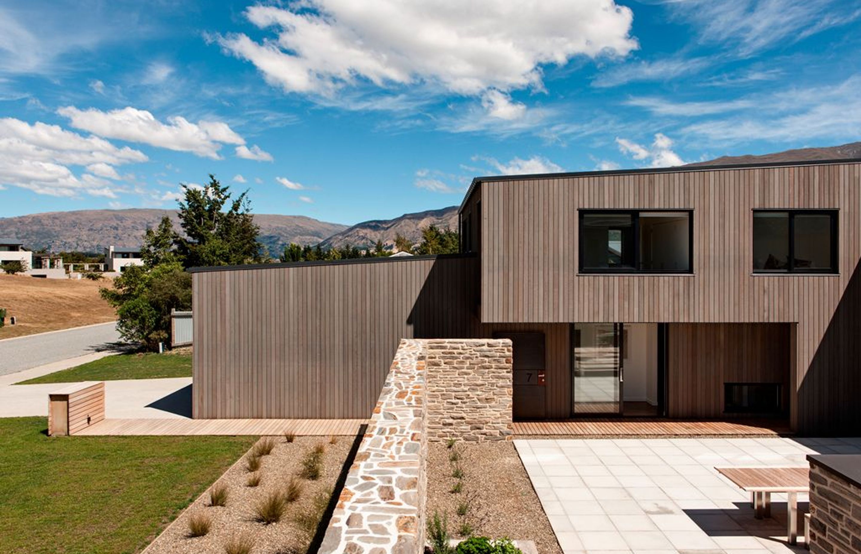 Briar Bank House project by Rafe Maclean Architects uses the INTERSET® Recessed Window Flashing System with vertical cedar cladding