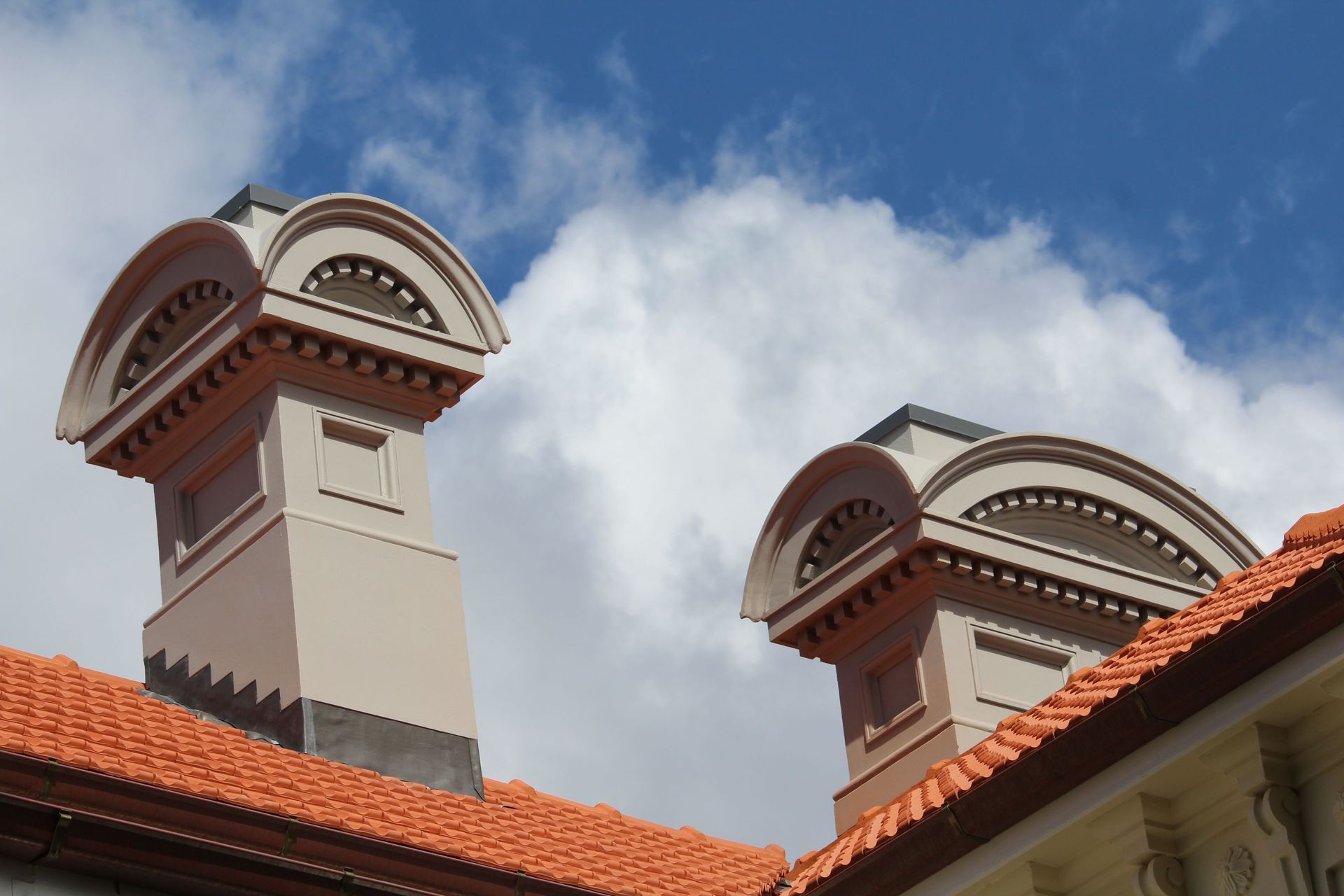 Painted to match the surrounding exterior.