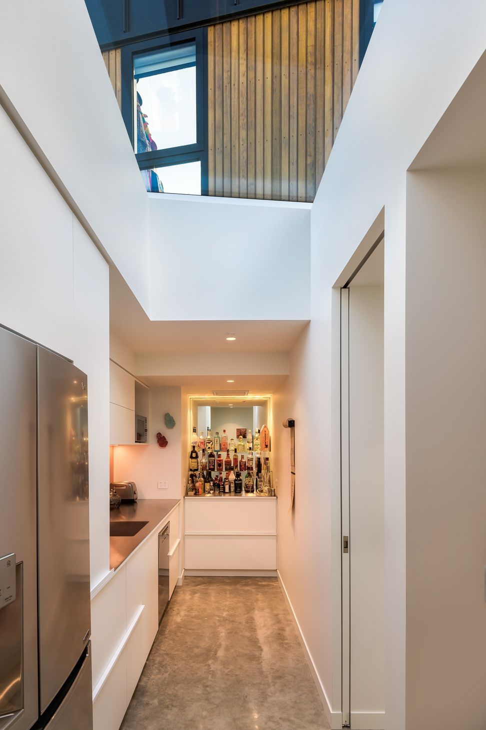 The bar is built into the end of the scullery.