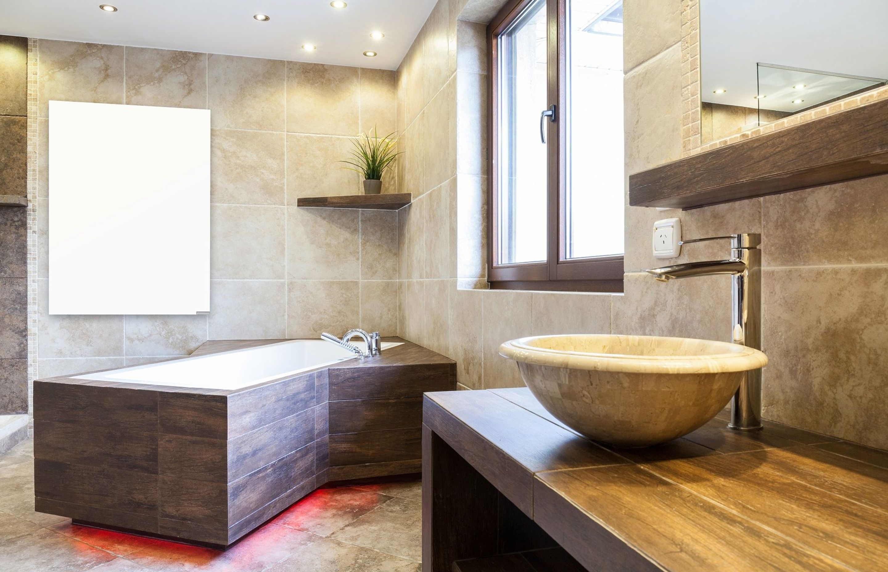 Infrared heater panels heat up objects in the room rather than the air.