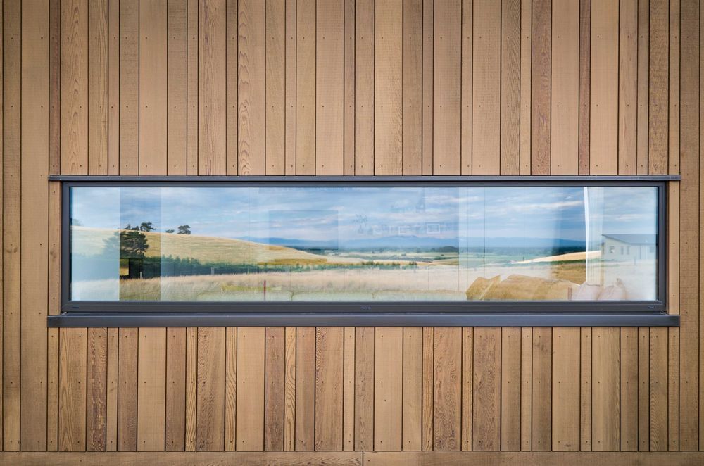 This Dalman Architecture project uses the INTERSET® Recessed Window Flashing System with random width cedar cladding