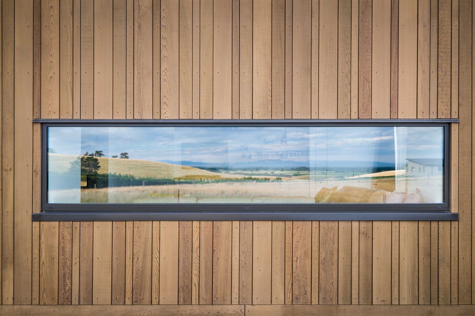 This Dalman Architecture project uses the INTERSET® Recessed Window Flashing System with random width cedar cladding