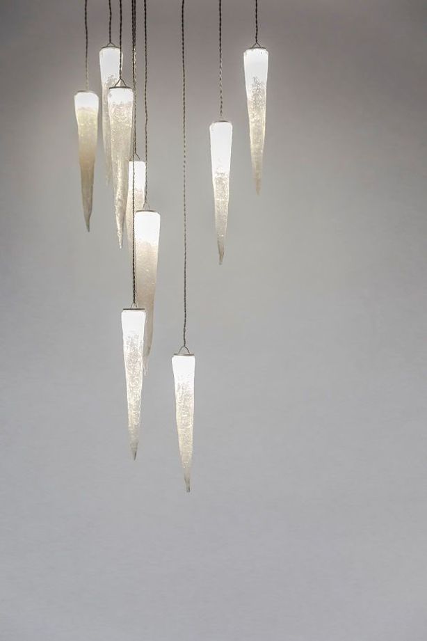 Stalactites: Inspired by a journey through a cave where calcite formations hang, each cast glass form is handcrafted.