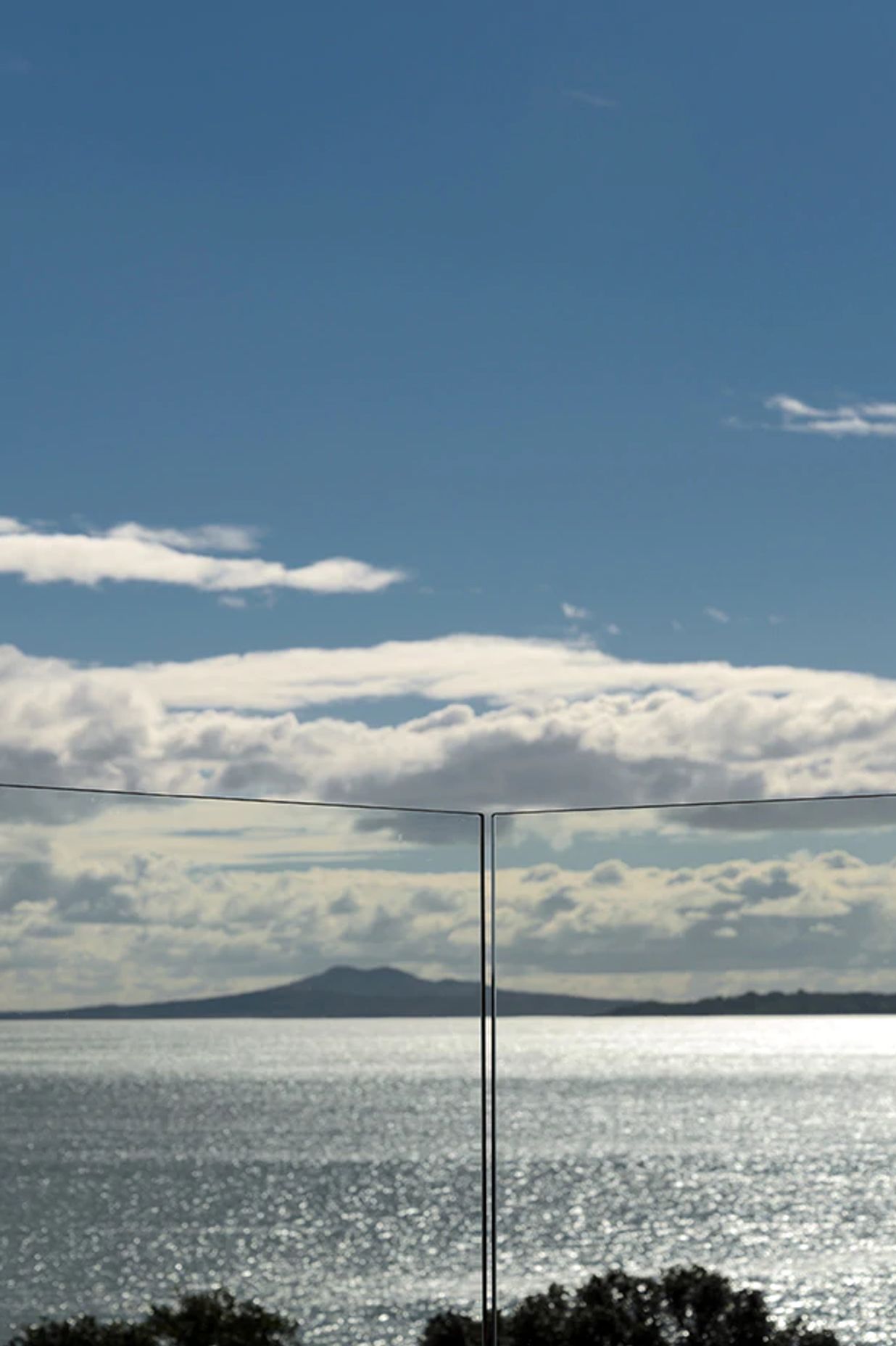 Let glass balustrades work their magic by keeping them free of anything that might obscure the view.