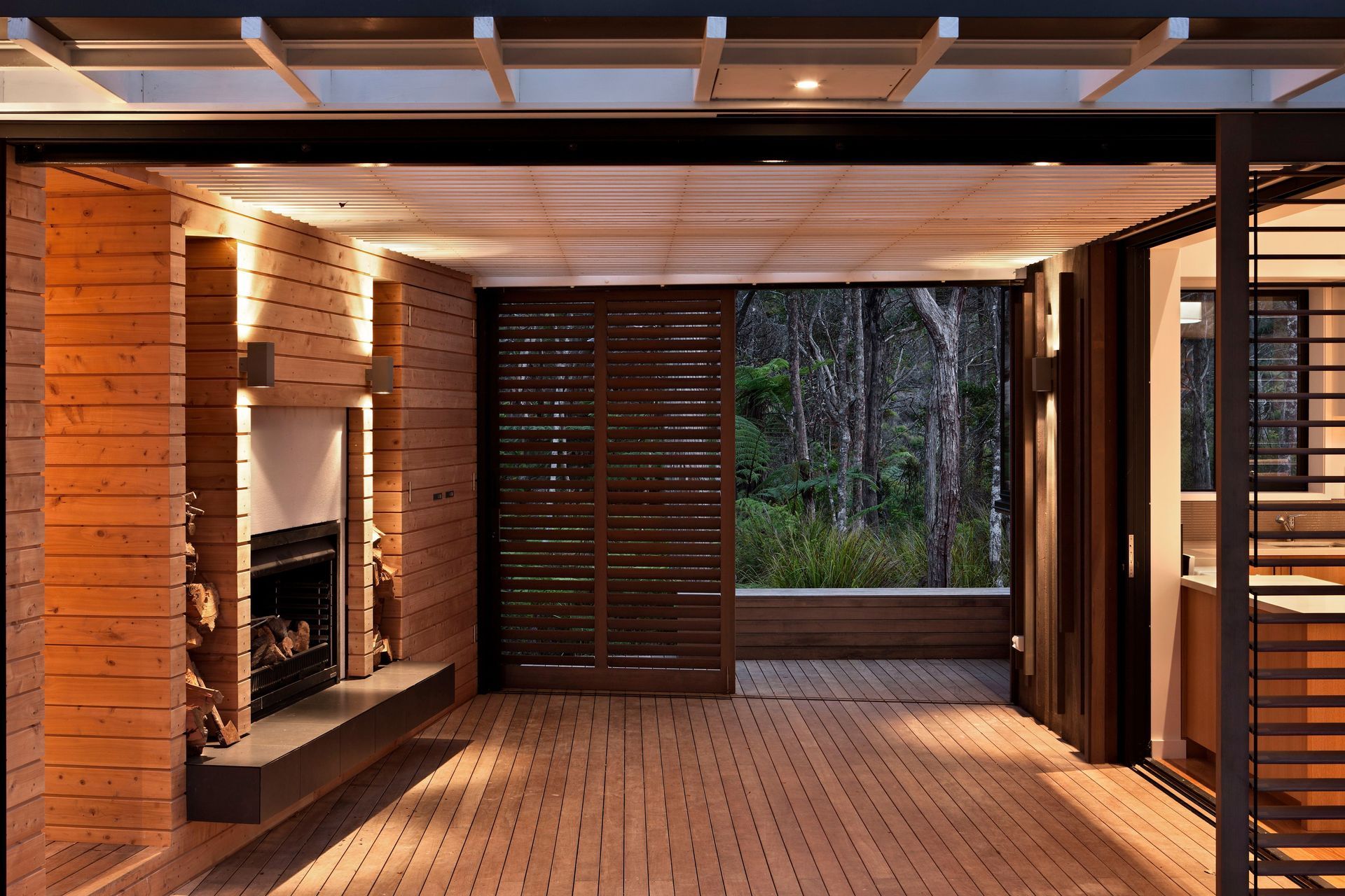 Pahi Bach by Scarlet Architects sits at one with its bush environment in the Kaipara Harbour.