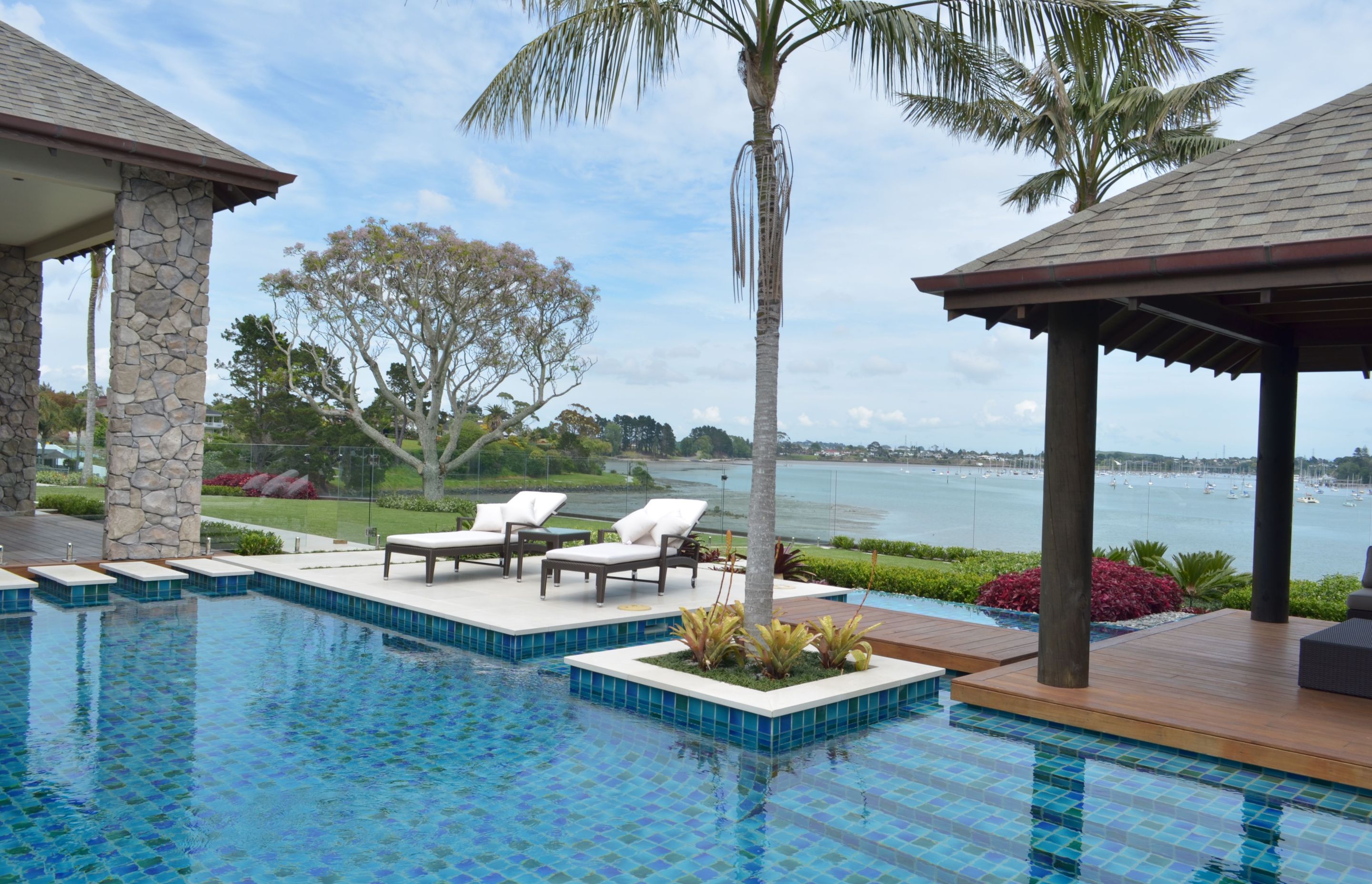 Without making the pool enclosed, this glass fencing allows the views and enough space to enjoy whilst still meeting all the swimming pool fencing criteria.