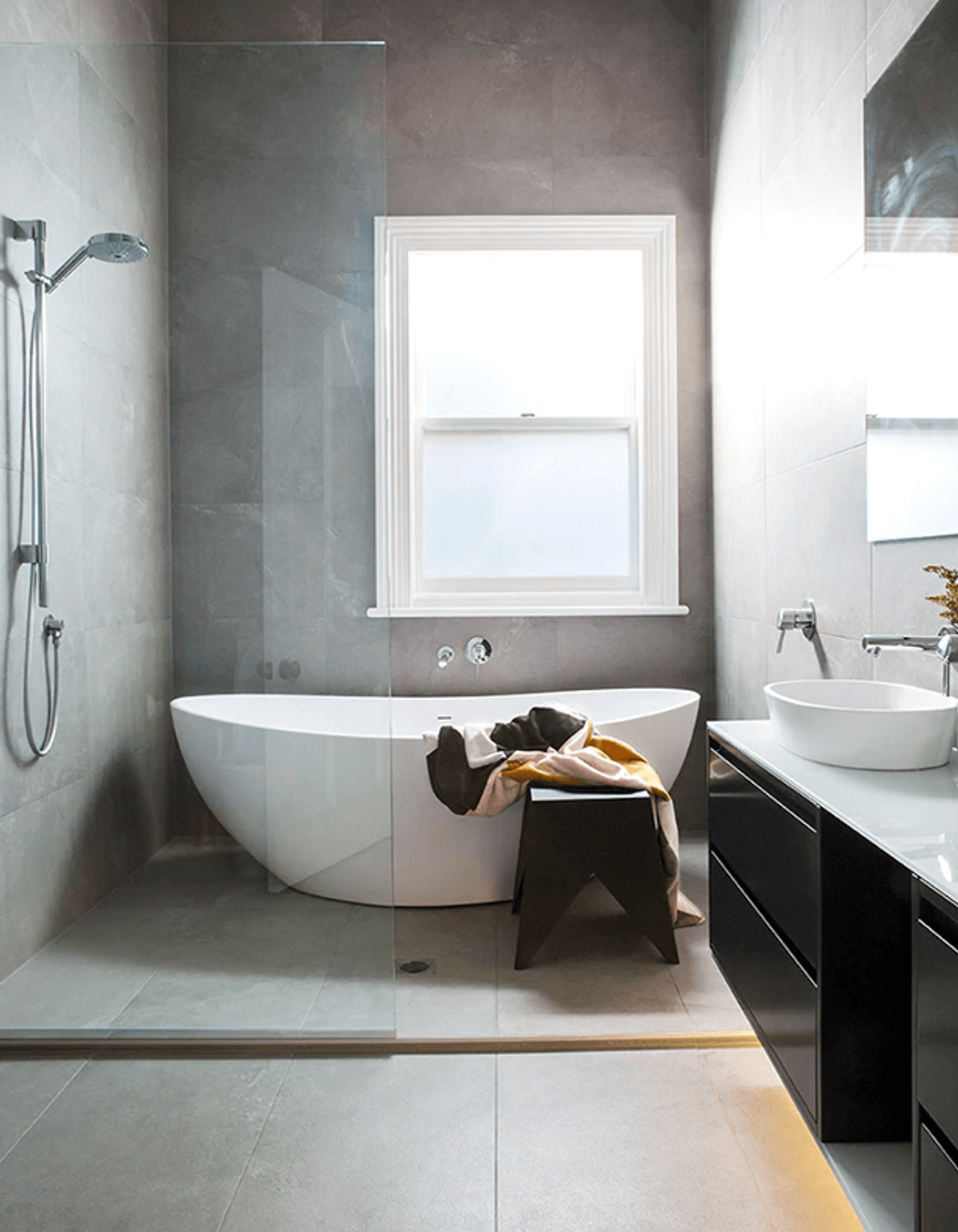 A freestanding tub is the ultimate luxury, but leave enough room around it for cleaning.